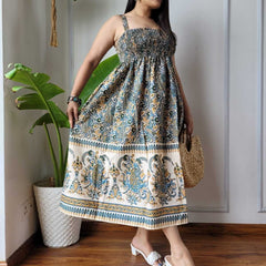 Women wearing teal blue cream paisley printed smocked cotton midi dress