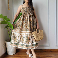 Women wearing beige cream paisley printed smocked cotton midi dress