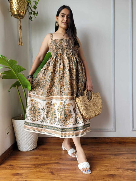 Women wearing beige cream paisley printed smocked cotton midi dress