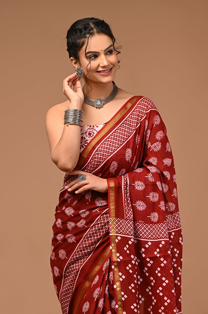 Lovwear Aarohi Brick Maroon & White Cotton Mulmul Saree with Golden Zari Border - Fabric Texture View
