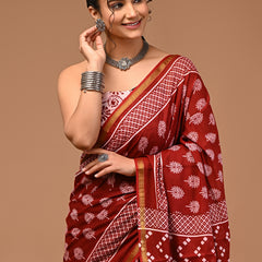 Lovwear Aarohi Brick Maroon & White Cotton Mulmul Saree with Golden Zari Border - Fabric Texture View