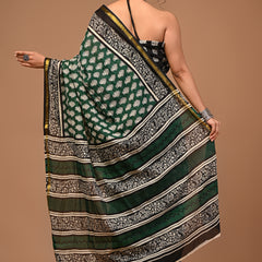 Lovwear Aadhya Forest Green Cotton Mulmul Saree with Rich Golden Zari Border - Front View