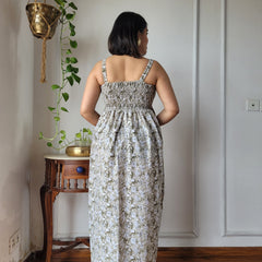 Women Beige Floral Printed Smocked Cotton Midi Dress - Flowy Flare View