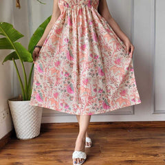 Women Cream & Pink Floral Printed Smocked Cotton Midi Dress - Flowy Flare View