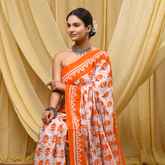 Women's Orange Ikkat & Bagru Print Pure Cotton Mulmul Saree - Front View
