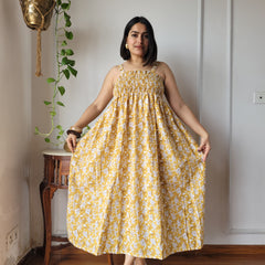 Women Mustard Yellow Floral Printed Smocked Cotton Midi Dress - Side / Back View