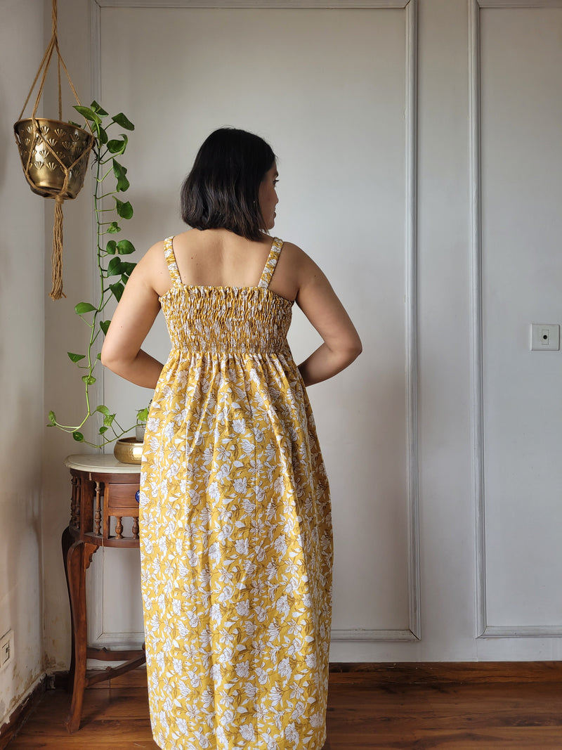 Women Mustard Yellow Floral Printed Smocked Cotton Midi Dress - Bodice & Fabric Detail View