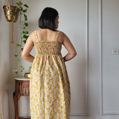 Women Mustard Yellow Floral Printed Smocked Cotton Midi Dress - Bodice & Fabric Detail View