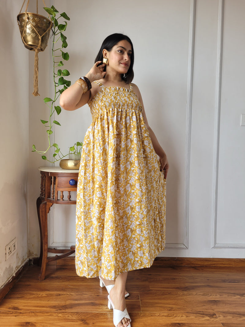 Women Mustard Yellow Floral Printed Smocked Cotton Midi Dress - Flowy Flare View