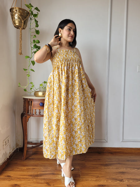 Women Mustard Yellow Floral Printed Smocked Cotton Midi Dress - Flowy Flare View