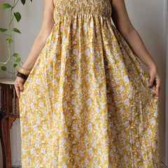 Women Mustard Yellow Floral Printed Smocked Cotton Midi Dress - Full Length View