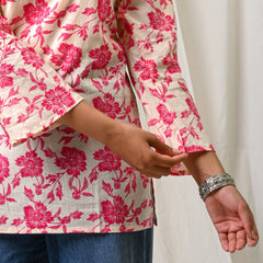 Cream pink floral printed cotton short kurti for women