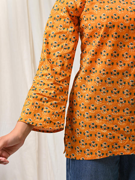 Orange floral printed cotton short kurti for women