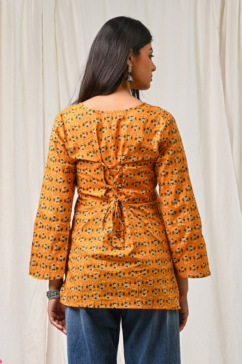 Women Orange Floral Printed Cotton Short Kurti - Side / Back View