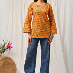 Women Orange Floral Printed Cotton Short Kurti - Detail View