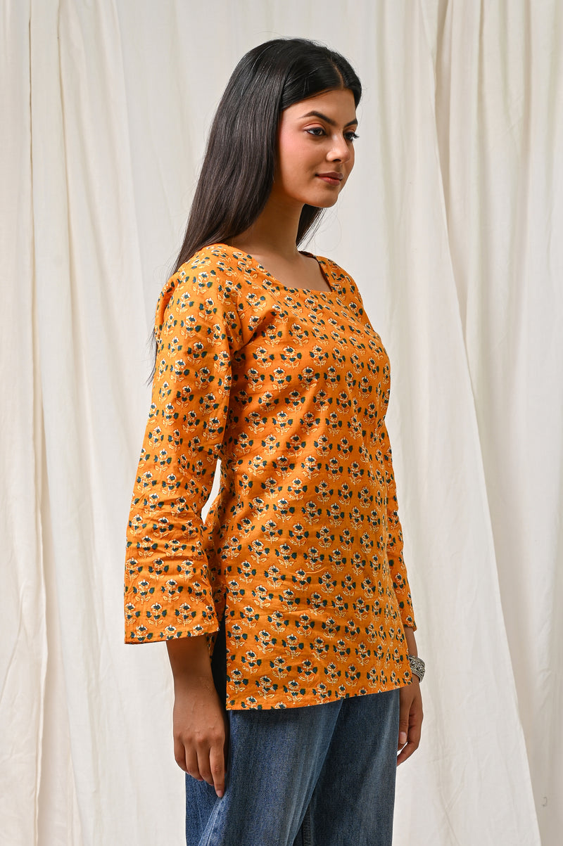 Women Orange Floral Printed Cotton Short Kurti - Flowy View