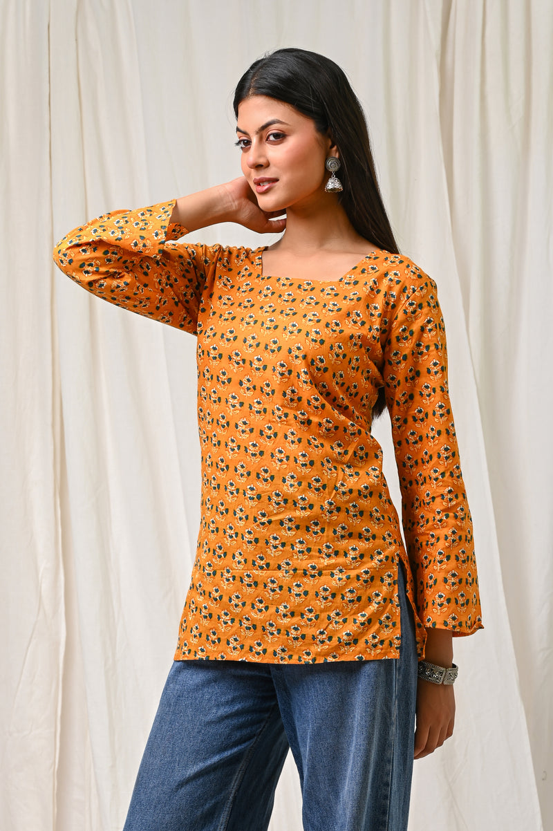 Women Orange Floral Printed Cotton Short Kurti - Full Length View