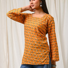 Women Orange Floral Printed Cotton Short Kurti - Full Length View