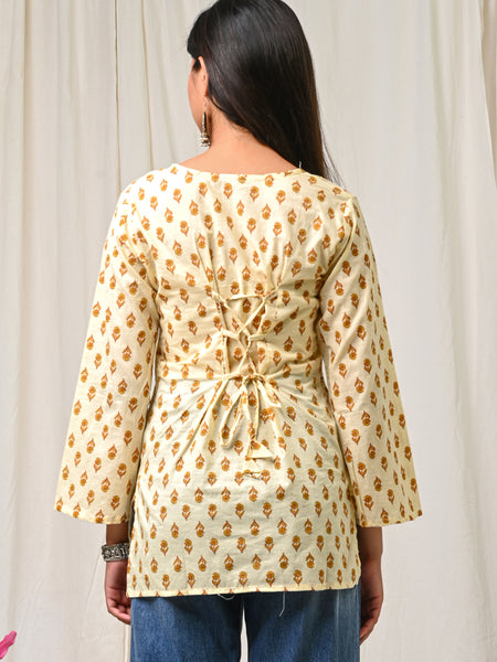 Women Cream Mustard Printed Cotton Short Kurti - Side / Back View