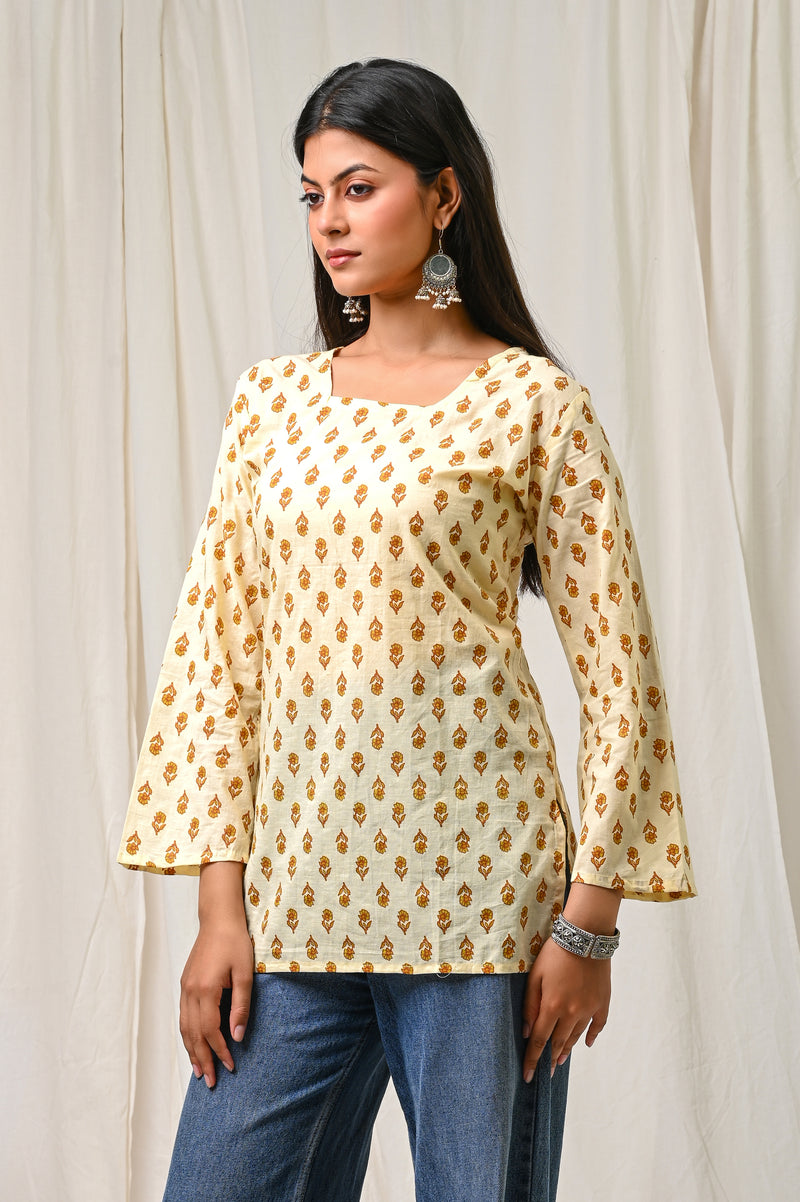 Women Cream Mustard Printed Cotton Short Kurti - Flowy View