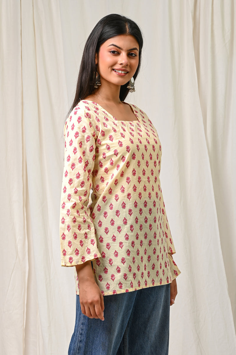 Women Cream Pink Printed Cotton Short Kurti - Flowy View