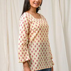 Women Cream Pink Printed Cotton Short Kurti - Flowy View